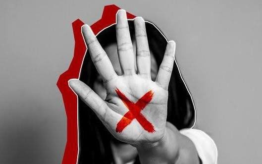 Foto de x vermelho na mão